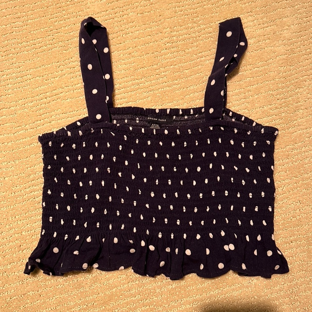 American eagle S dark blue with white polka dot cropped tank with ruffled bottom